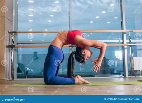 Young Woman Doing Yoga Exercises On Mat At Gym Stock Image Image Of Healthy Practicing 79216409