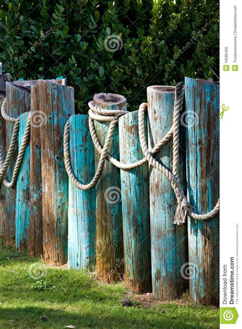 Large Rope Draped Over A Fence Nautical Landscaping Backyard Fences