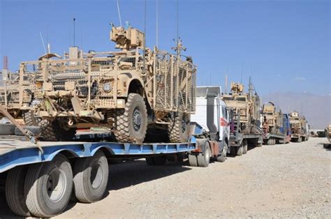 Mine Resistant Ambush Protected Vehicles Loaded And Secured On Flat Bed Trucks In The 3 401st
