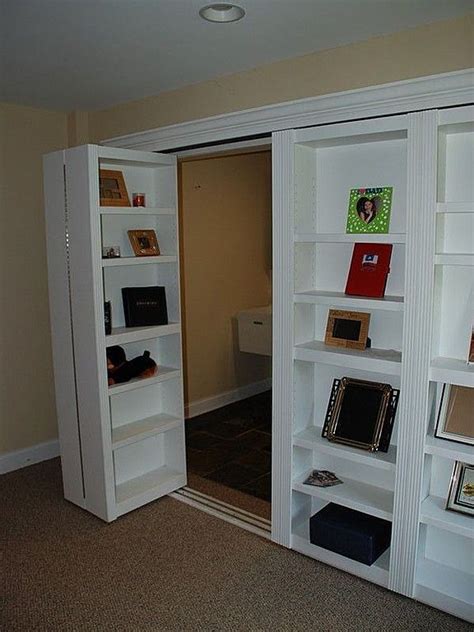 Amazing gallery of interior design and decorating ideas of hidden closet doors in closets, girl's rooms, nurseries, dining rooms, bathrooms, kitchens, entrances/foyers by elite interior designers. closet door bookshelves | Home, House, Hidden rooms