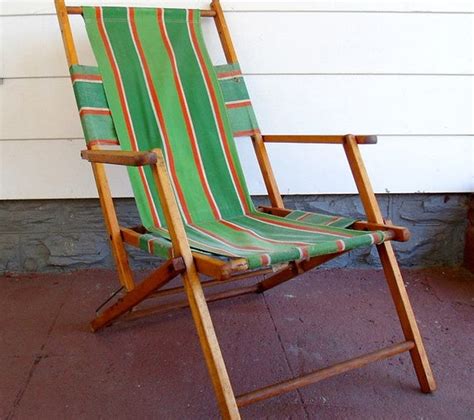 The peligo beach line is an updated version of vintage style beach chairs. Vintage Wood and Canvas Folding Beach Chair Retro Telescope