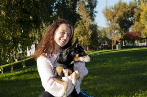 Portrait Of Happy Autumn Woman Love Her Dog Woman Hugging Dog In