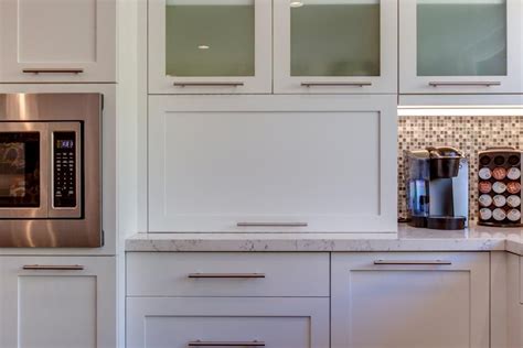 Streamlined White Cabinets In Contemporary Kitchen