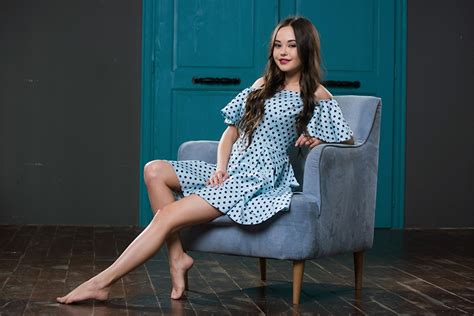 Photo Li Moon Brown Haired Smile Girls Legs Sitting Wing Chair