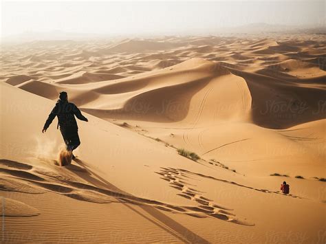 Two People Running In Desert By Martin Matej Stocksy United