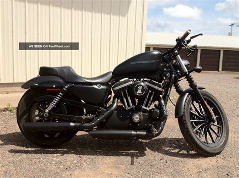 This one has more sporty credentials and as the name suggests is the recipient of an 883cc the bike weighs in at 260kg and is available in three colours vivid black, big blue pearl and black denim. Wallpapers 2015 Harley Davidson Iron 883 - Wallpaper Cave