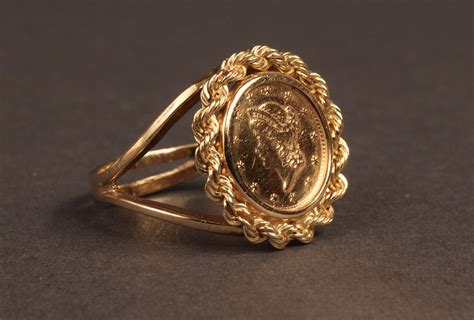 Lot 244 Ladies 14k Gold Coin Ring