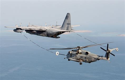 Watch The Us Navys Biggest Helicopter Refuel From A Plane While