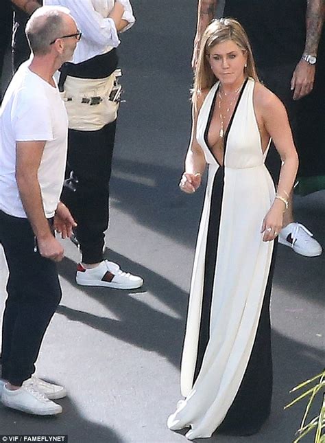 Bold And Beautiful Jennifer Aniston Stuns In Low Cut Dress On The Set Of SmartWater Ad Campaign