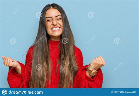 Beautiful Hispanic Woman Wearing Casual Clothes Very Happy And Excited Doing Winner Gesture With