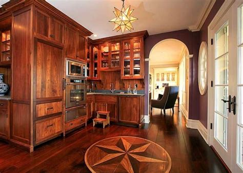 Find the studs in the wall behind the cabinet and mark their positions on the cabinet. 27 Wood Kitchen Ideas | Décor Outline