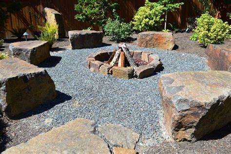 The 30 outdoor round wood burning fire pit with concrete baseweighs 44.2 lbs. rustic fire pit and boulder seats from Sublime Garden ...