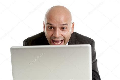 Businessman Typing On Computer Keyboard With Funny Face Expression