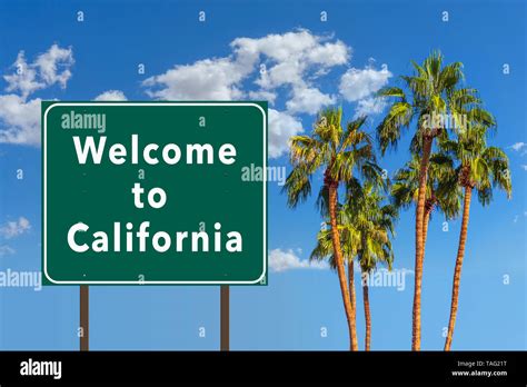 Welcome To California Road Sign With Palm Trees Stock Photo Alamy