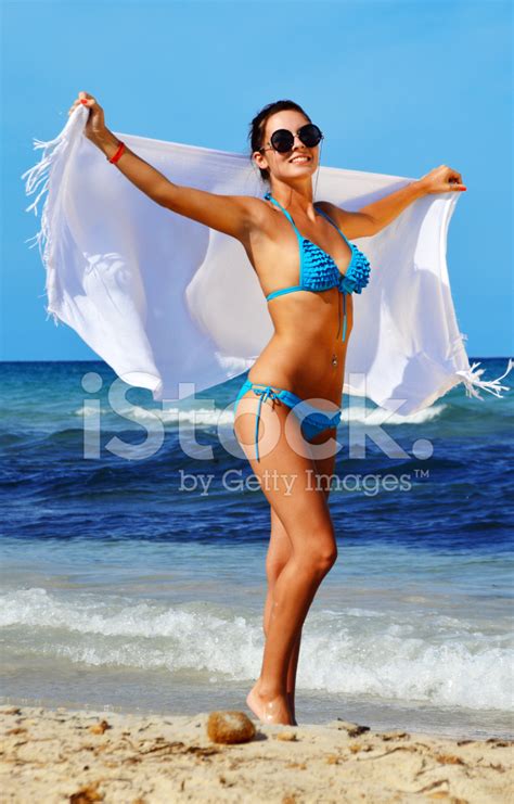 Young Woman On The Mediterranean Beach Stock Photos