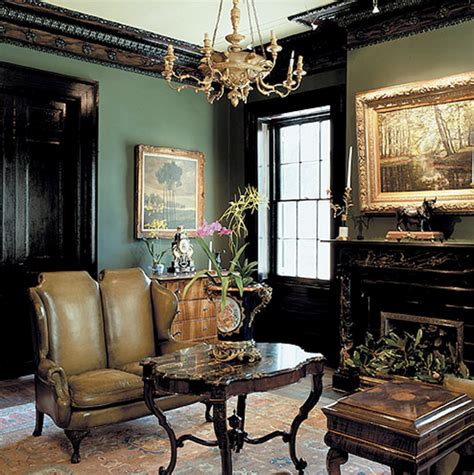 Gold antique accents, mossy green walls, glossy black ...