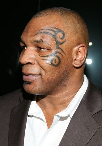 Mike tyson tattoo is very popular these days. Top 10 Worst Celebrity Tattoos - First Class Fashionista