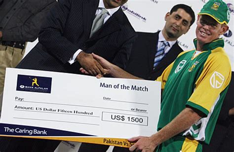 Shaun Pollock Poses With His Man Of The Match Cheque