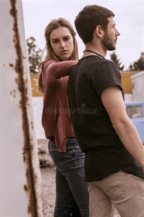 A Guy And A Girl Are Walking On The Street Stock Image Image Of