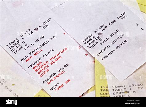 greasy restaurant guest food order tickets in pile stock photo royalty