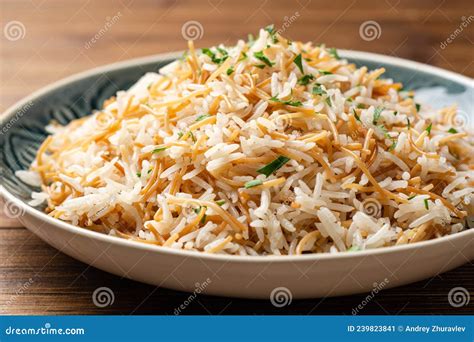 Rice With Vermicelli In Plate On Wooden Background Traditional Arabic