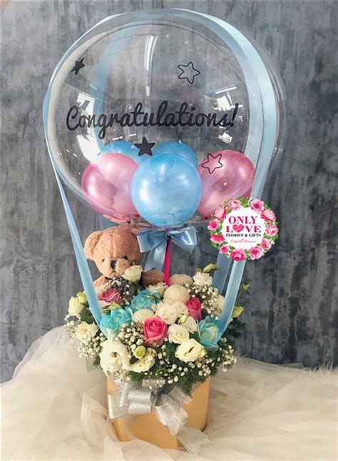 We are committed to offering only the finest floral arrangements and gifts,backed by service that is friendly and prompt. HAB05 Hot Air Balloon Bloom Box sameday flower delivery to ...