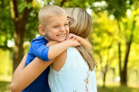Little Son Hugging His Mother Stock Photo Image Of Emotion Lifestyle