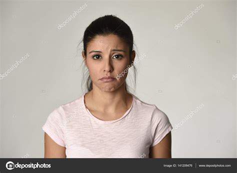 Young Beautiful Hispanic Sad Woman Serious And Concerned In Worried