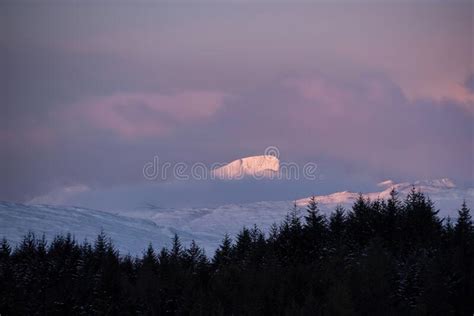 Majestic Alpen Glow Hitting Mountain Peaks In Scottish Highlands During