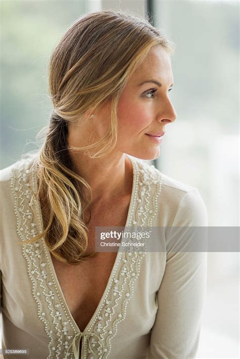 Mature Blonde Woman Looking Away Portrait Photo Getty Images