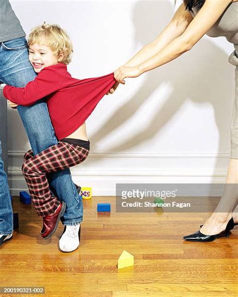 Girl Pulling Her Mom Photos And Premium High Res Pictures Getty Images