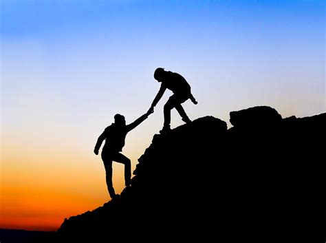 Silhouette Of Helping Hand Between Two Climber Edwards Performance