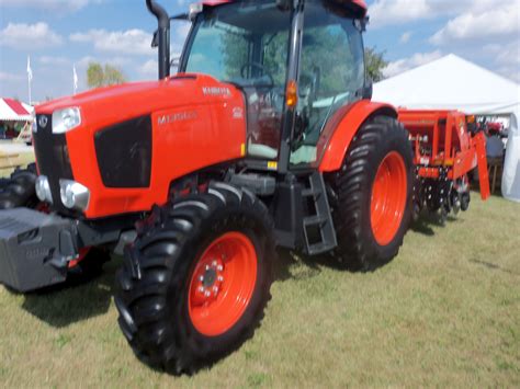 Orange Kubota M135gx Tractor Farm Equipment Tractors Kubota
