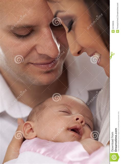 Mixed Race Young Couple With Newborn Baby Royalty Free