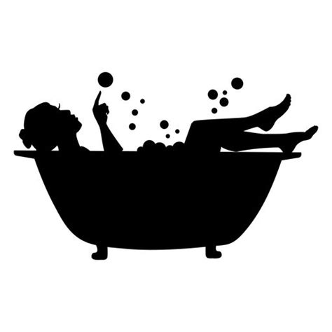 A Woman Laying In A Bathtub With Bubbles