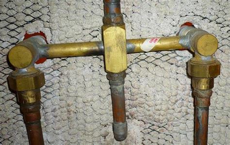 Remove nut/cap by unscrewing counter clockwise by hand. Shower diverter valve stub removal?