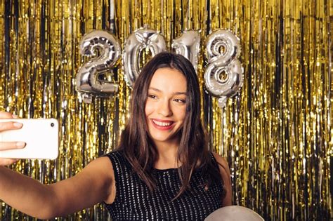 Free Photo Girl Taking Selfie On New Year Celebration