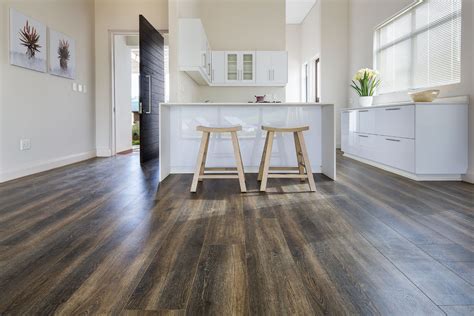 Laminate flooring that looks like tile is commonly used in residential spaces because it gloss level varies in laminate floors. Brown Stone - 1 Strip | Black Forest Laminate | Finfloor