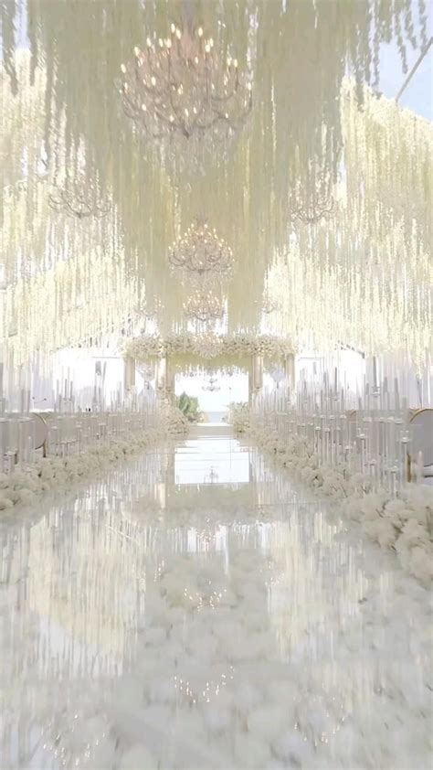 A Majestic All White Heavenly Ceremony Under A Gorgeous Blue Sky