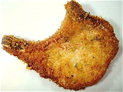 While boneless chops may be cheaper, it's the bone that keeps the pork chop moist and imparts flavor. Panko-Crusted Thin-Cut Pork Chops | The Hungry Mouse