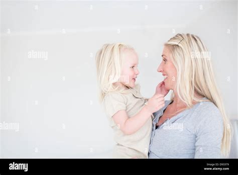 Mother And Little Daughter Face To Face Stock Photo Alamy