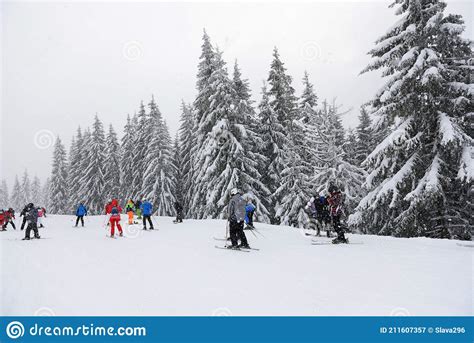 The Skiers And Snowborders Are On Slope In Bukovel Ski Resort Editorial