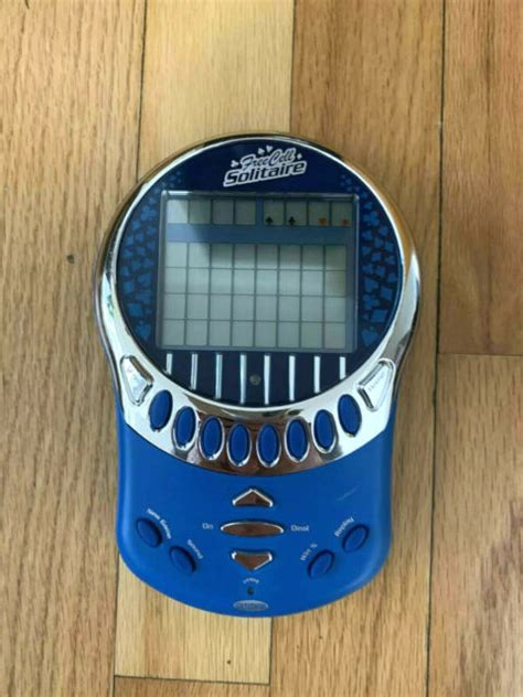 Radica Big Screen Free Cell Solitaire Lighted Electronic Handheld Game