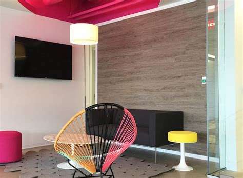 Cut around walls and obstructions using a utility knife. Office Flooring: Luxury Vinyl on Walls
