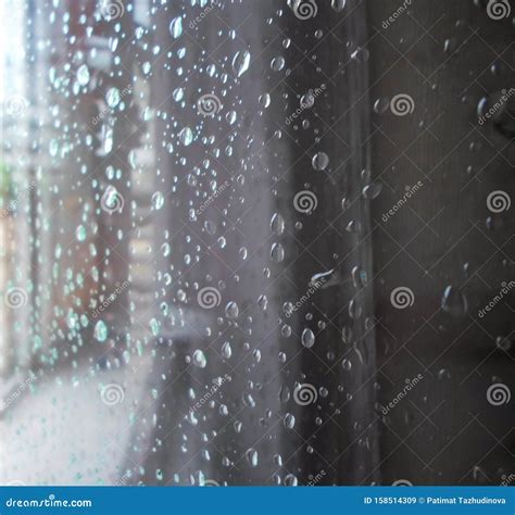 Raindrops On A Window Pane Drops Of Water On A Metal Surface On A