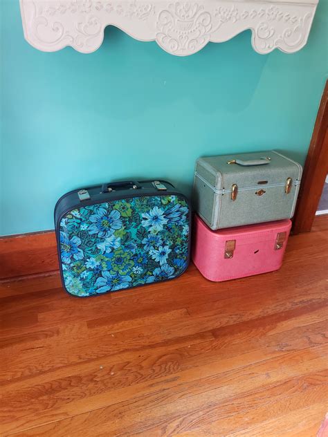 My little thrifted luggage collection. I just found the pink last week