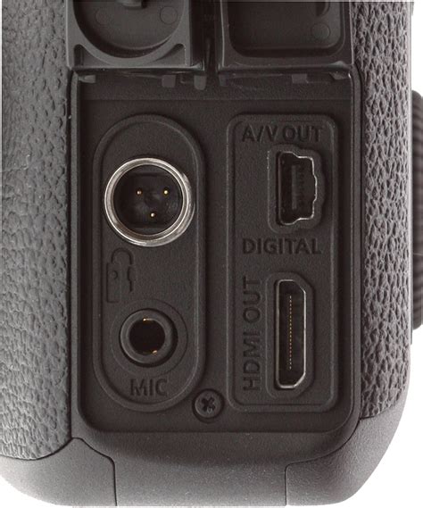Connect the cable to the digital terminal with the plug's < > icon facing the back of the camera. Canon 6D Review - Video