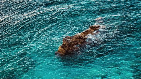 Download Wallpaper 1920x1080 Sea Rocks Aerial View Water Coast Full Hd Hdtv Fhd 1080p Hd