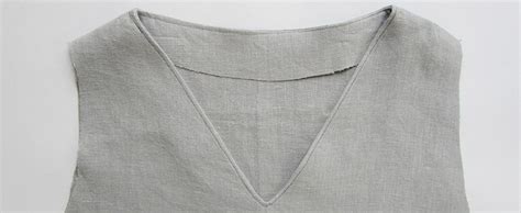 {and stretch stitch will do} open up the neckline, the shoulder. Sewing Glossary: How to Sew a Facing to a V-Neckline Tutorial