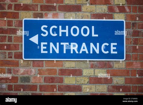 School Entrance Sign On Brick Wall Of School Building Stock Photo Alamy